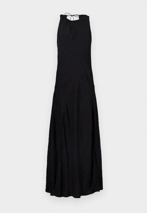Black maxi dress with a halter neckline, featuring a tied back, flowing shape, and a textured surface that adds subtle detail.