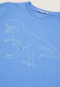 Camiseta de algod�ón azul claro con un diseño en contorno blanco de un dinosaurio T-Rex impreso en la parte delantera. Cuello redondo y mangas cortas.