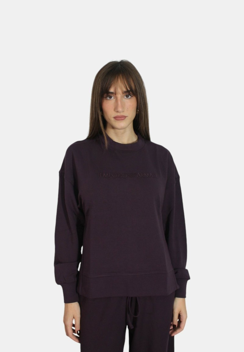 Felpa viola realizzata in tessuto morbido, con collo tondo a coste, vestibilità ampia e logo impresso sul petto.