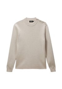 Pull en beige en tricot doux. Il possède un col rond et trois boutons décoratifs sur l'épaule gauche. Manches longues.