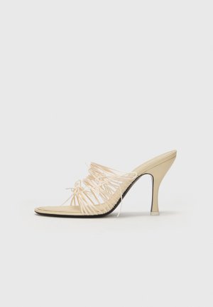 AURIGA - Heeled mules - cream