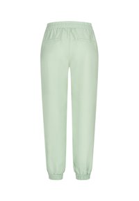 Pantalons de jogging vert clair en tissu lisse, avec une taille élastique et des poignets fuselés, dotés de deux poches arrière.