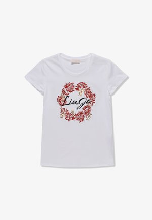 T-shirt bianco in cotone a maniche corte, con una stampa floreale rossa decorativa e la scritta "Liu Jo" in corsivo nero al centro.
