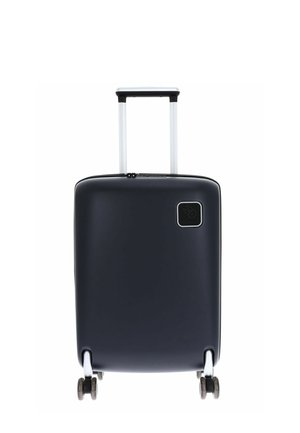 Valise rigide bleu marine à quatre roues, poignée télescopique argentée et petit cadenas électronique carré à l'avant.