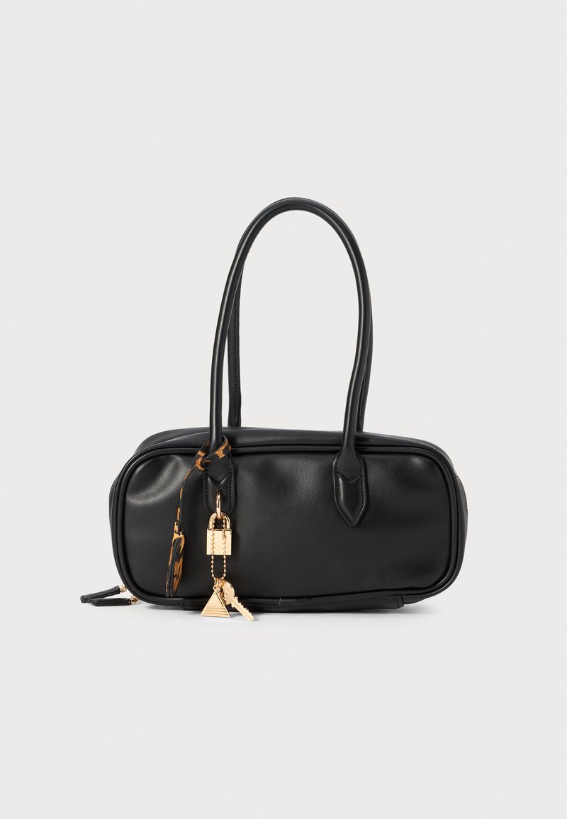 Black leather handbag with two handles, rectangular shape, gold hardware, and a decorative keychain. Smooth texture with minimal accents.