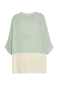 Maglione a maglia con una vestibilità ampia, caratterizzato da una parte superiore verde menta e una parte inferiore crema. Maniche corte, tessuto testurizzato e scollo ampio.