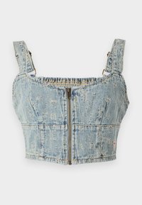 Denim crop top with a light blue wash, features zipper closure, smocked back, and wide straps. Details include stitching and slight distressing.