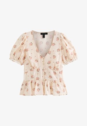Cream short-sleeve blouse with pink floral print, V-neck, button front, puffed sleeves, and ruffled hem.