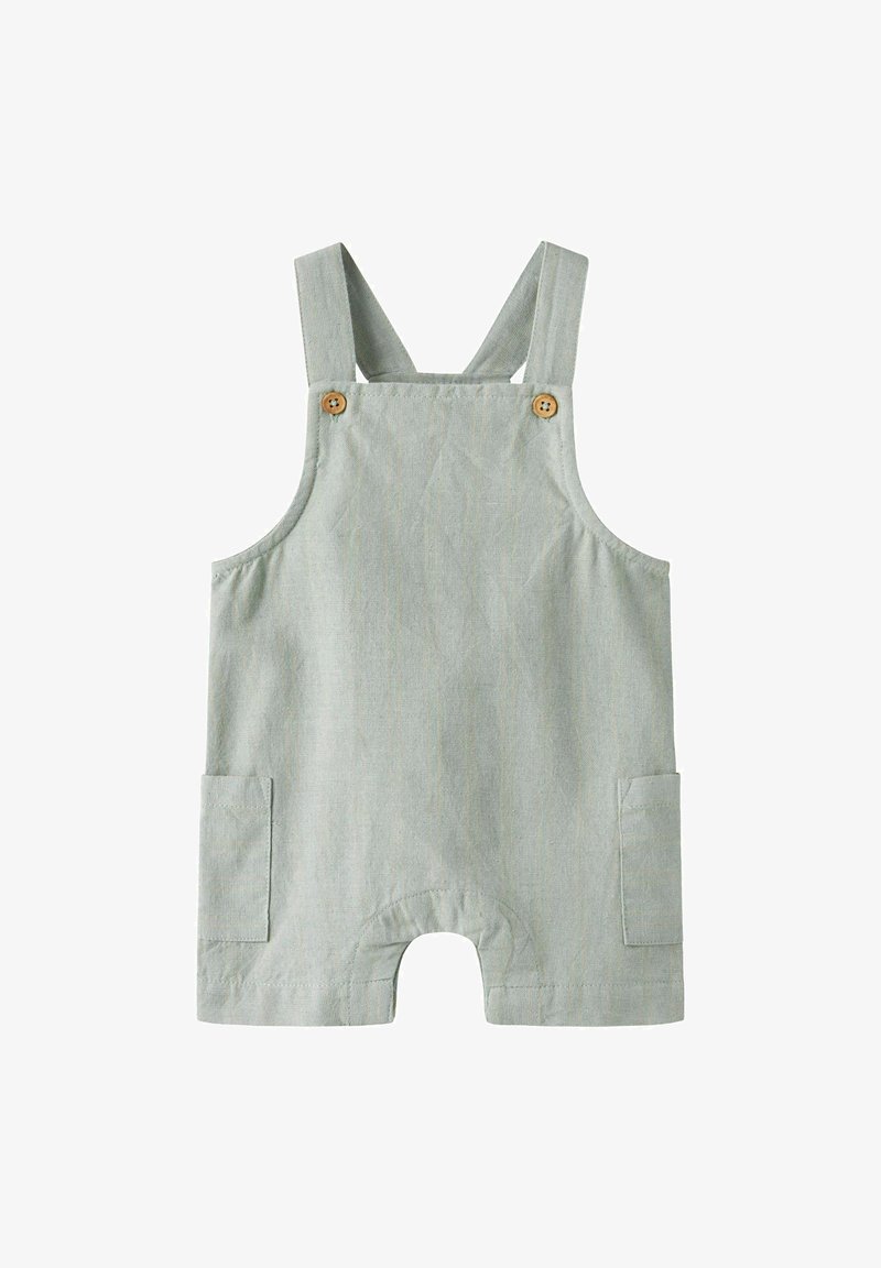 Svetlozelený ľanový romper s ramienkami, akcenty z drevených gombíkov, dve bočné vrecká a okrúhly výrez na spodnej časti.