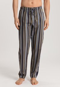 Gestreepte pyjamabroek met verticale strepen in blauw, marineblauw en geel, een elastische tailleband met koord en een ontspannen pasvorm.