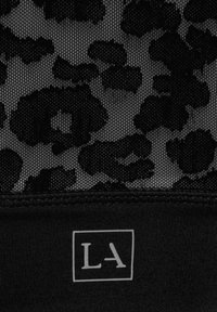 Black mesh fabric featuring a leopard print pattern, with a solid black band at the bottom that has a white "LA" logo.