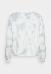 Sweat-shirt tie-dye à manches longues gris clair et blanc avec poignets côtes, vu de dos sur fond blanc.