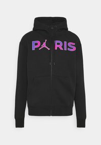 Sudadera con cremallera negra que presenta un gráfico en morado y rosa de "PARIS" y el logo de Air Jordan en el pecho. Incluye un bolsillo tipo canguro y capucha con cordón.