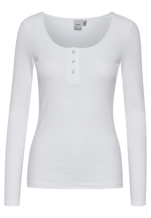 Top bianco a maniche lunghe in tessuto a coste, con scollatura a girocollo e una patta con tre bottoni sul petto, dotato di una silhouette aderente e texture liscia.