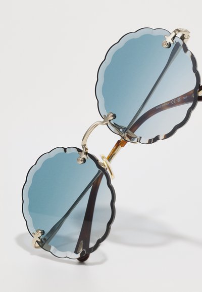 CHLOÉ ROSIE RIMLESS ROUNDED METAL SUNGLASSES - Óculos de sol - gold-coloured/blue