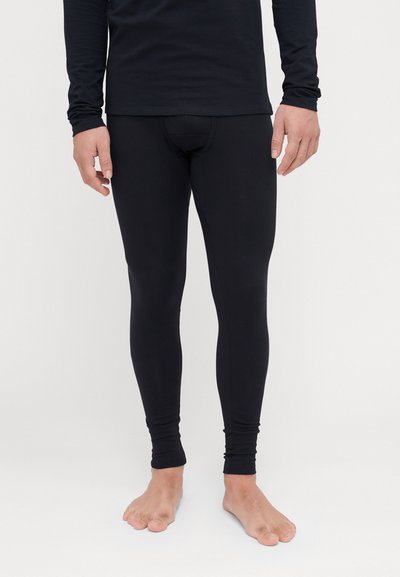 Schwarze Leggings aus dehnbarem Material, mit schlankem Schnitt, glatter Textur und knöchellanger Passform. Keine Muster oder sichtbaren Beschläge.