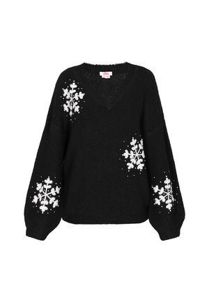 Mustapaitainen neule, jossa on V-kaula-aukko, valkoisilla lumisateen kuvioilla hihoissa ja yksityiskohdissa, sekä rento istuvuus.