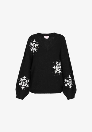 Sort strikket sweater med V-hals, prydet med hvide snefnugdesign på ærmerne og detaljer, samt en afslappet pasform.