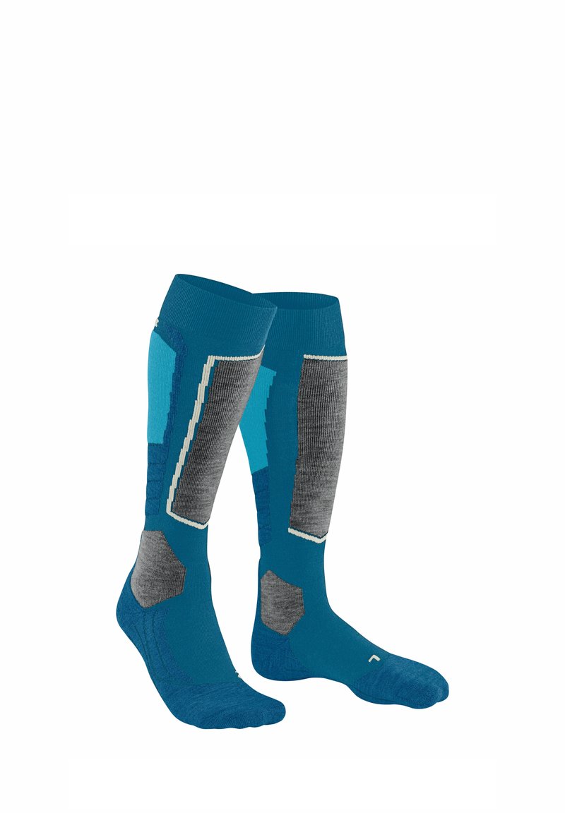 Calze al ginocchio in teal, grigio e azzurro chiaro. Presentano motivi testurizzati e sezioni rinforzate. Realizzate in materiale elasticizzato e traspirante.