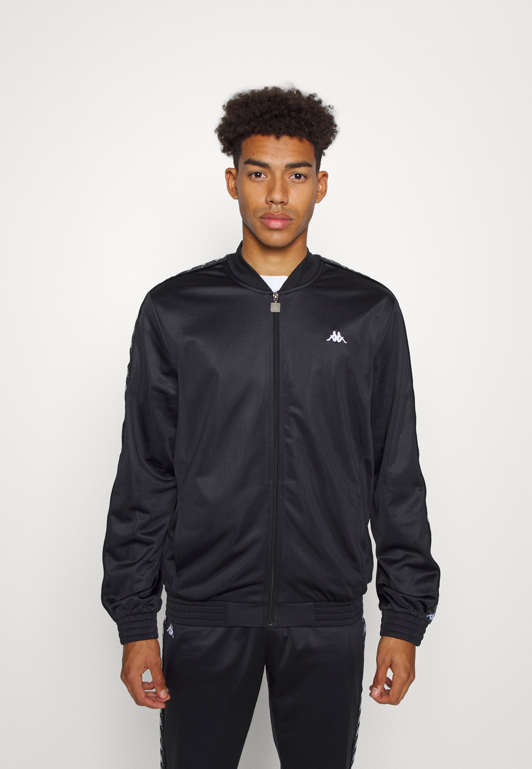 Kappa Tuta - caviar/nero - Zalando.it
