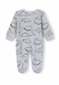 Grå langærmet onesie med sorte dinosaur-illustrationer, der viser forskellige arter og legende mønstre over stoffets overflade.