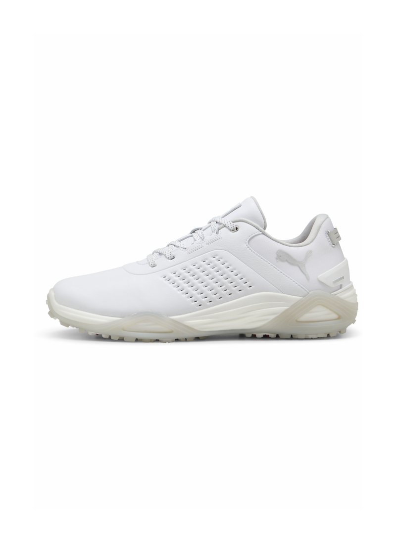 Pantofii sport albi au un superior sintetic neted, cu lateral perforat pentru ventilație și talpă din cauciuc texturată. Au accente gri și șireturi.