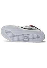 Shoe sole with a textured white rubber base, featuring a grid pattern and a logo. Dark gray and silver accents on the upper part.