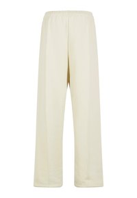 Pantaloni de trening de culoare crem, cu un talie elastică, design cu picior drept și detalii subtile de cusătură pe lateral. Textură de țesătură moale.