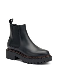 Botas Chelsea de cuero negro con paneles laterales elásticos, suela de goma gruesa y costuras decorativas a lo largo de la base. Diseño de punta redondeada.