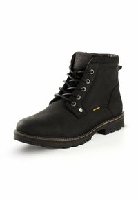 Bottine en cuir noir avec bout rond, œillets métalliques, lacets gris et coutures beiges sur la semelle. Semelle en caoutchouc avec motif de traction.