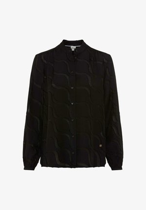 Schwarze Bluse mit einem strukturierten Wellenmuster, Knopfleiste vorne und langen Ärmeln mit elastischen Bündchen. Kleines Logodetail an der Seite.