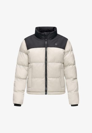Vadderad jacka med en svart övre del och en krämfärgad nedre del, med en dragkedja och stickade muddar för extra värme.