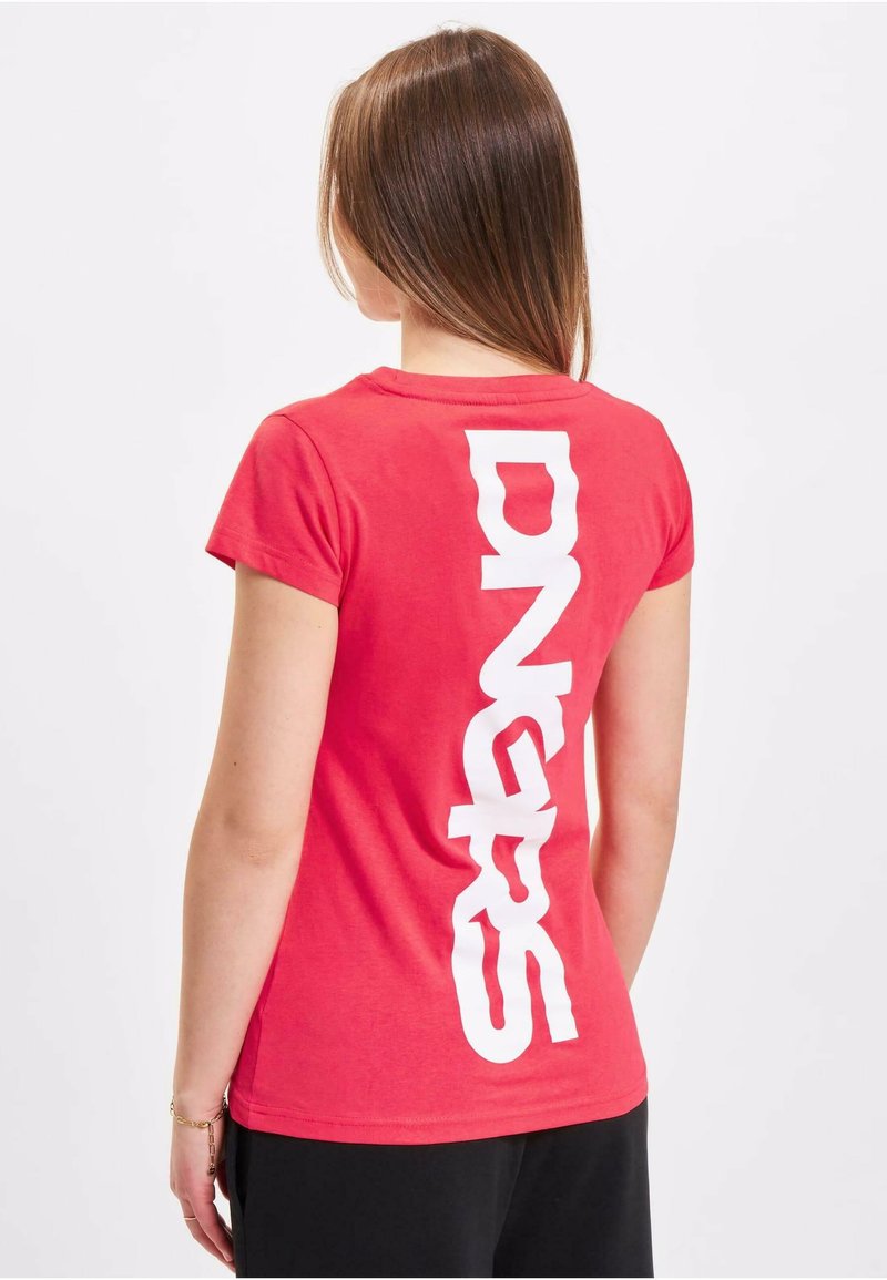 Red cotton t-shirt with short sleeves and a crew neck; features large white lettering "DNGRS" printed vertically on the back.
