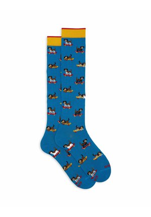 Calzini blu con illustrazioni giocose di cani su skateboard, con accenti gialli e rossi sui polsini, realizzati in morbido cotone.