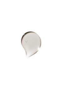 Goutte claire et visqueuse de gel transparent avec une texture lisse ; forme légèrement allongée avec une finition brillante et de petites bulles d'air.