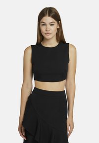 Zwart cropped top met een ronde halslijn en mouwloos ontwerp, gemaakt van een gladde, strakke stof. Past bij een bijpassende rok.