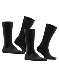 Calcetines de algodón negros en un paquete de tres. Presentan puños acanalados, una textura suave y un diseño clásico de longitud hasta el tobillo.
