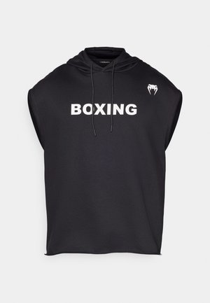 Black sleeveless hoodie made of fabric with a smooth texture. Features a large white "BOXING" print on the front and a small logo on the shoulder.