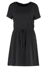 Robe courte noire à manches courtes avec des pois blancs, dotée d'un col rond et d'une ceinture à la taille pour une silhouette cintrée. Texture de tissu lisse.