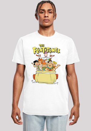 White cotton t-shirt featuring a colorful cartoon graphic of characters from "The Flintstones" in a car, with bold yellow text above.