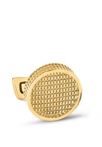 Gold circular brooch with textured grid pattern, featuring a polished metallic surface and a distinctive clasp on one side.