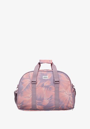 Roxy duffle bag with a purple background, featuring a pink tropical leaf pattern, dual top handles, and a front pocket. Durable fabric with smooth texture.