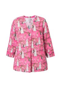 Blusa rosa con stampa ripetuta di conigli e fiori, con scollatura a V e maniche a tre quarti. Realizzata in tessuto leggero.