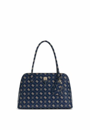 Sac à main de créateur bleu marine avec des logos floraux beiges, forme structurée, doubles poignées et une petite étiquette suspendue avec des accents dorés.