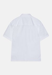 White short-sleeve button-up shirt shown from the back with a classic collar and a horizontal seam across the upper back.