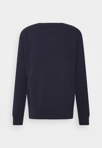 Felpa blu navy con collo rotondo e maniche lunghe, caratterizzata da una texture liscia e da un dettaglio di cuciture a contrasto sul collo.