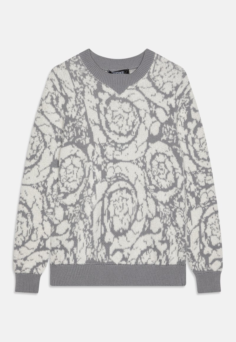 Pull gris clair avec un motif floral en blanc cassé. Conception en V, poignets et ourlet côtelés, et texture tricotée douce.