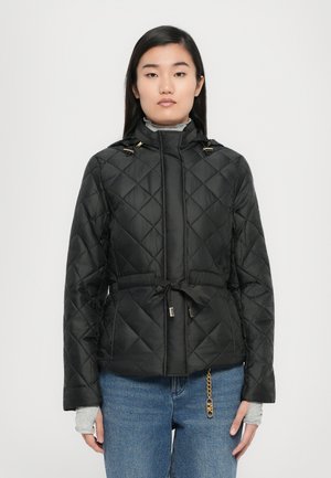 Black quilted jacket with a high collar, drawstring hood, and a belted waist. Features gold hardware accents and textured fabric.