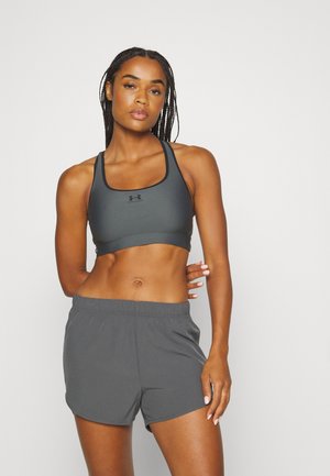 UA HG ARMOUR MID PADLESS - Medium support sports bra - pitch gray/black