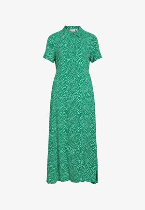Zielona sukienka midi z krótkim rękawem, białym, nieregularnym wzorem kropek, zapinana na guziki z przodu, kołnierzykiem i rozcięciem po boku na jednolitym tle.